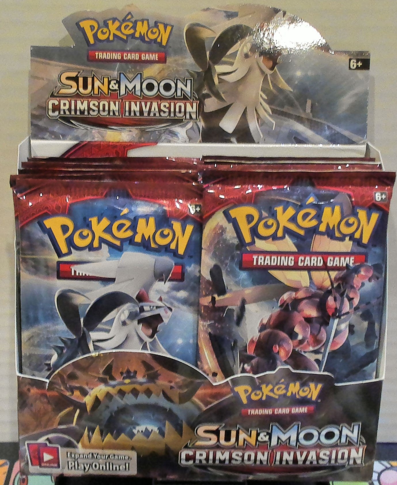 Sun & Moon Crimson Invasion booster pack box